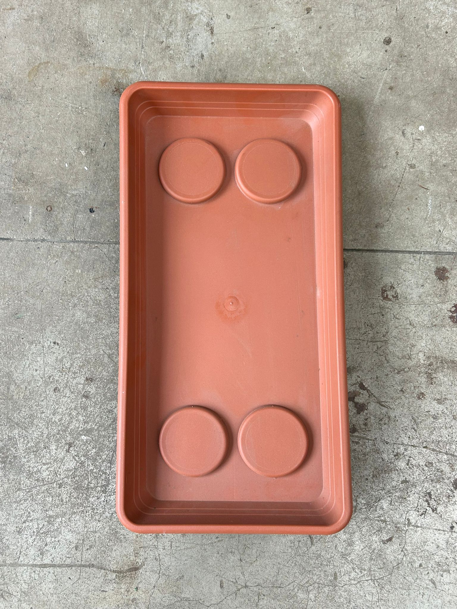 Set sottovasi in plastica color terracotta – assortiti – usato
